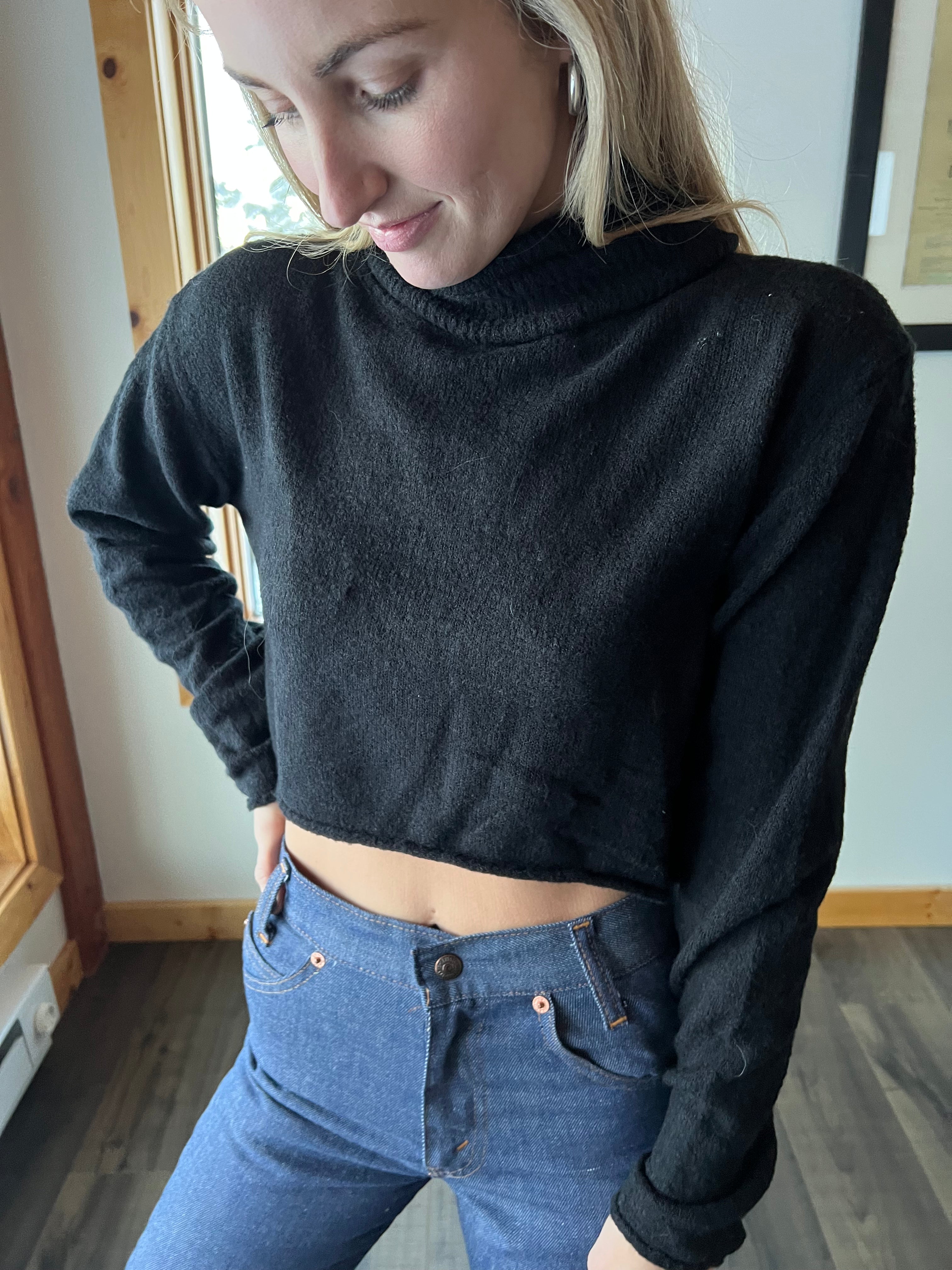 55: NWT Black Sweater